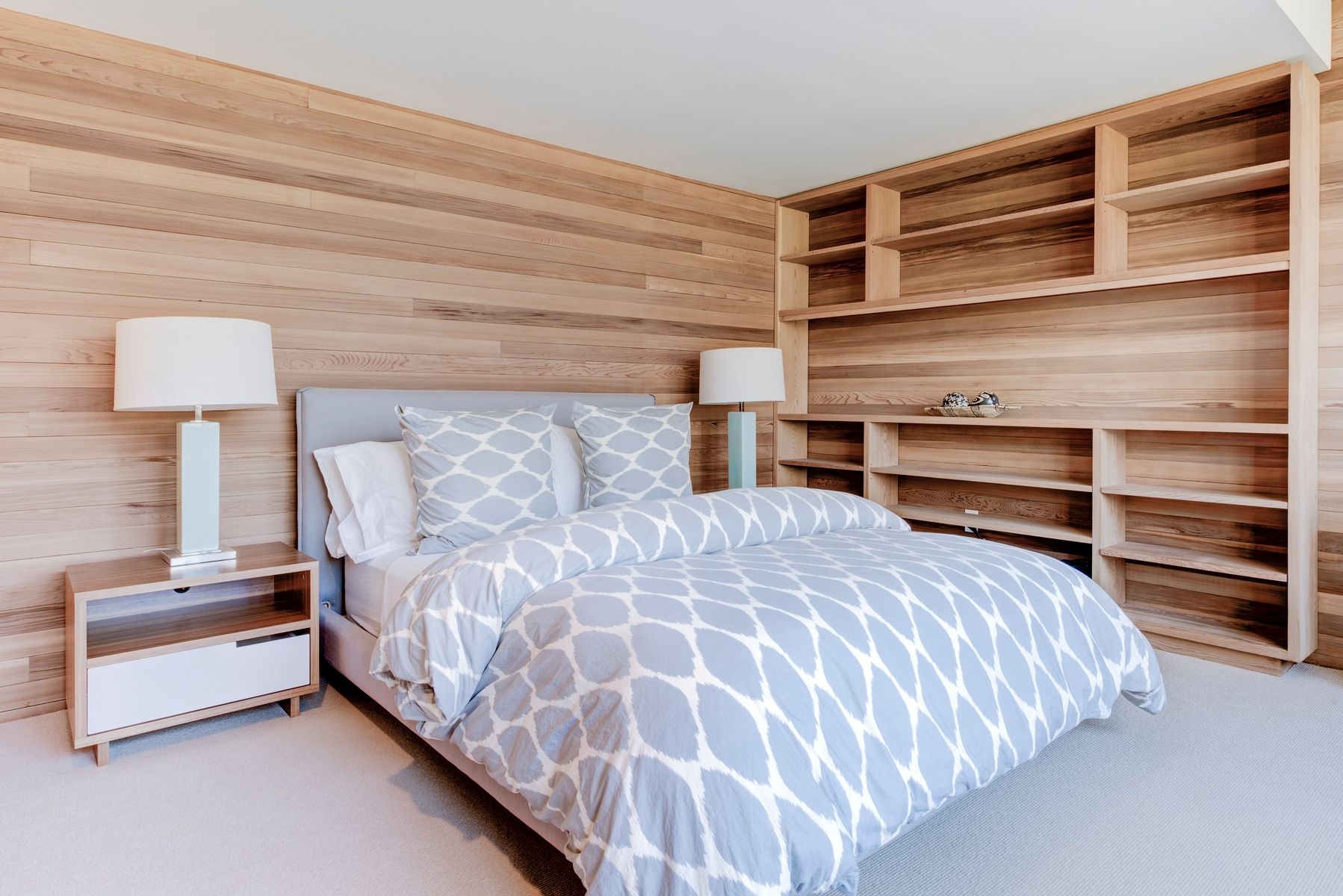 77 Cross Highway East Hampton, NY 11937 - Photo 10 of 17 a bedroom with a bed and a lamp on table