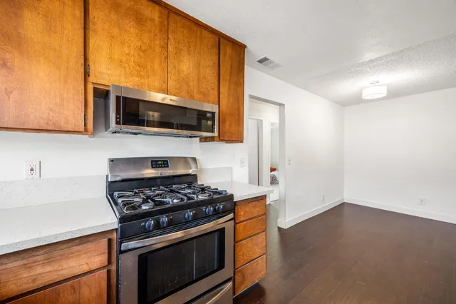 a bathroom with a shower and a sink