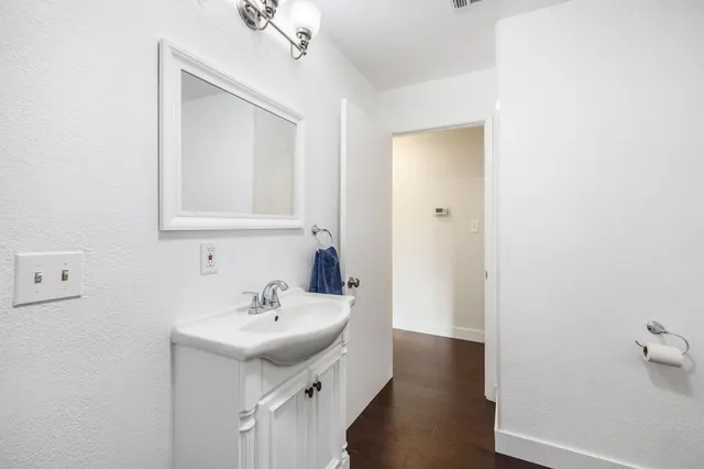 a bedroom with bed and a window