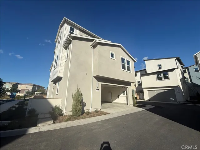 a house view with a outdoor space