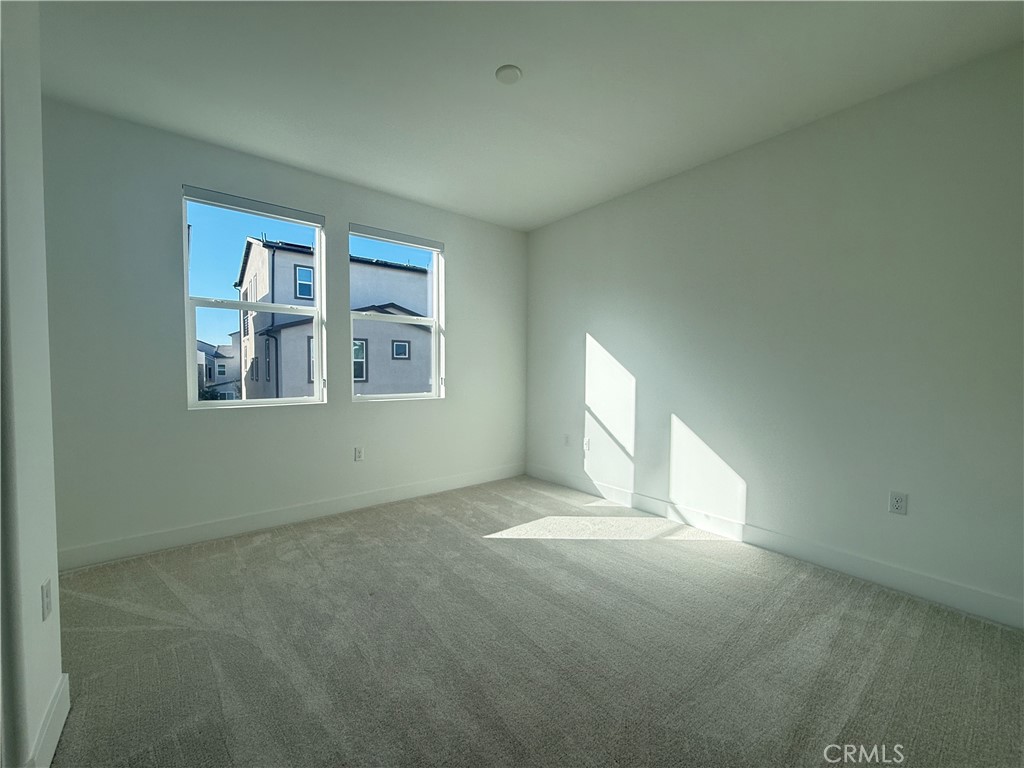 313 Proctor Irvine, CA 92618 - Photo 11 of 24 an empty room with windows