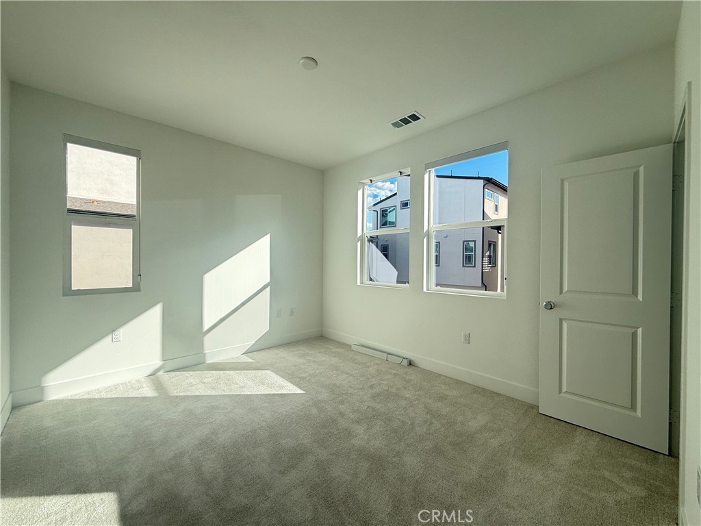 313 Proctor Irvine, CA 92618 - Photo 13 of 24 an empty room with windows