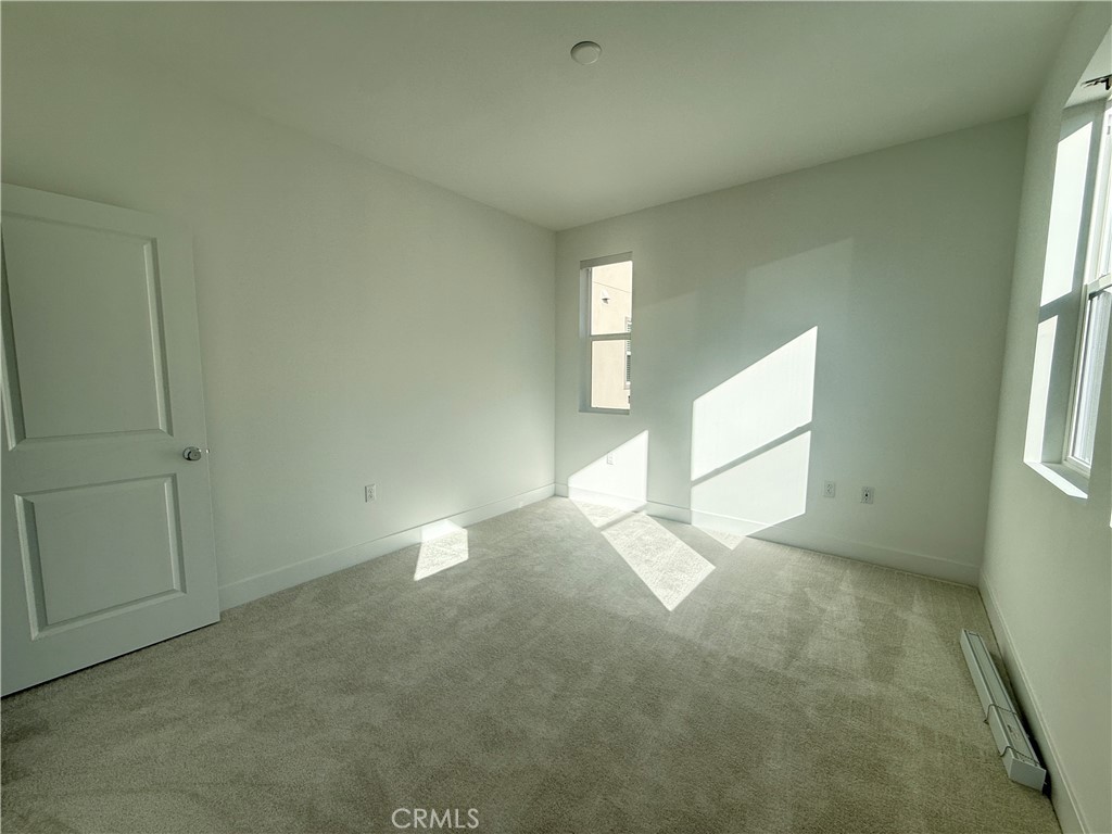 313 Proctor Irvine, CA 92618 - Photo 14 of 24 an empty room with windows