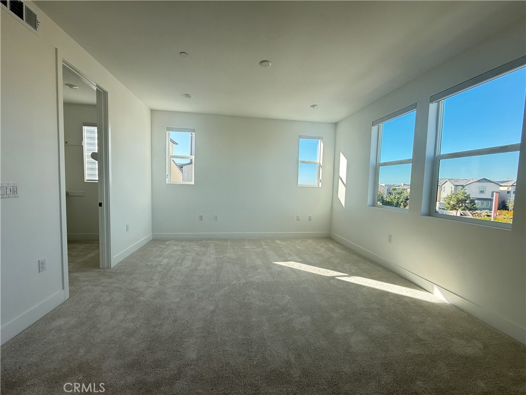 313 Proctor Irvine, CA 92618 - Photo 9 of 24 an empty room with windows