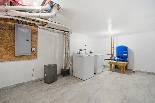 a view of a livingroom with furniture and storage
