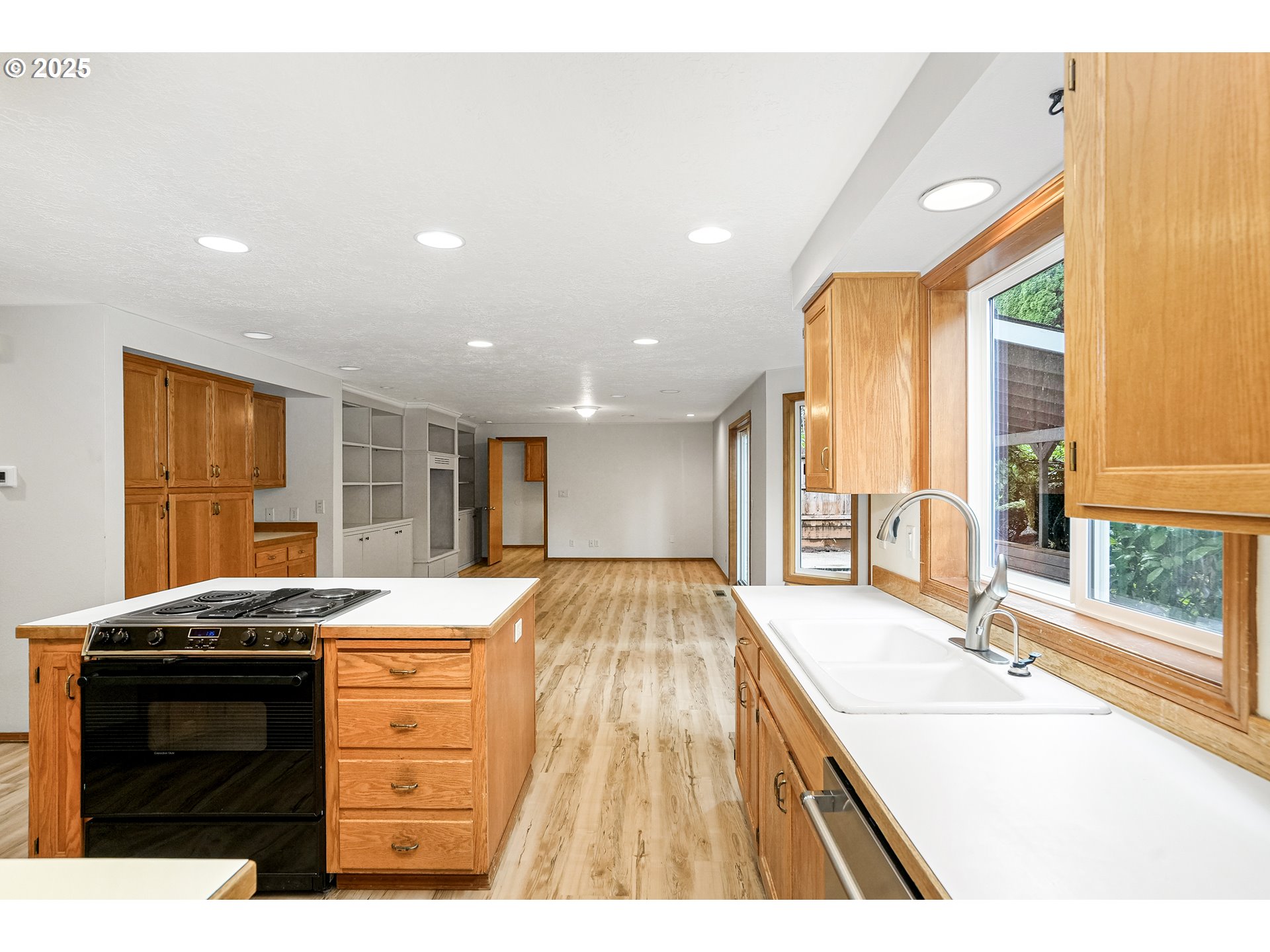 5561 Springwood Avenue Southeast Salem, OR 97306 - Photo 12 of 42 a spacious bathroom with a granite countertop sink and a large window