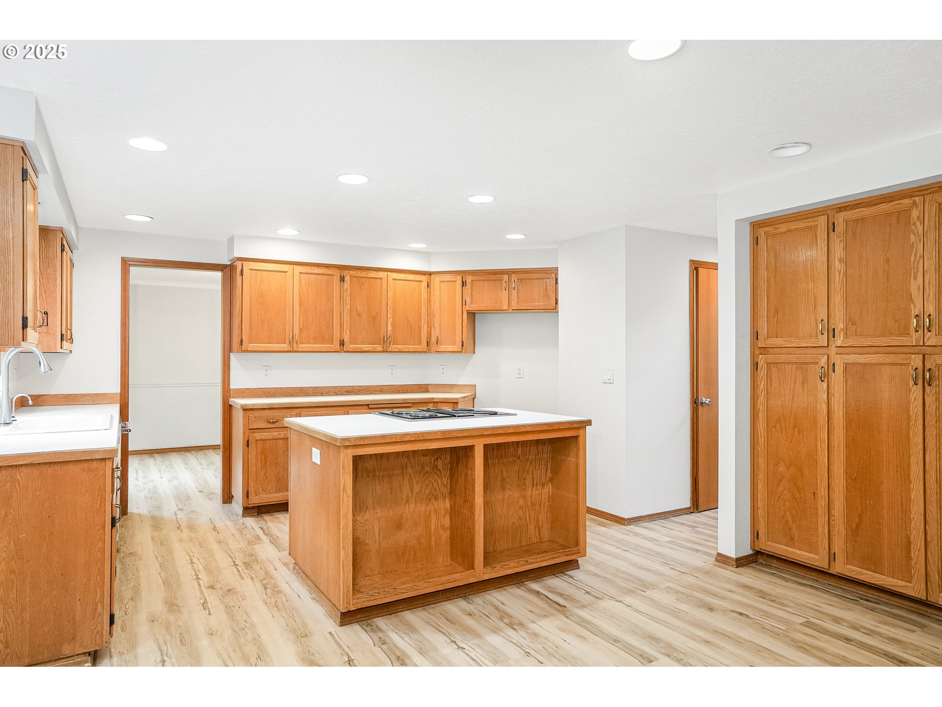 5561 Springwood Avenue Southeast Salem, OR 97306 - Photo 14 of 42 a kitchen with stainless steel appliances granite countertop a stove a sink and a refrigerator