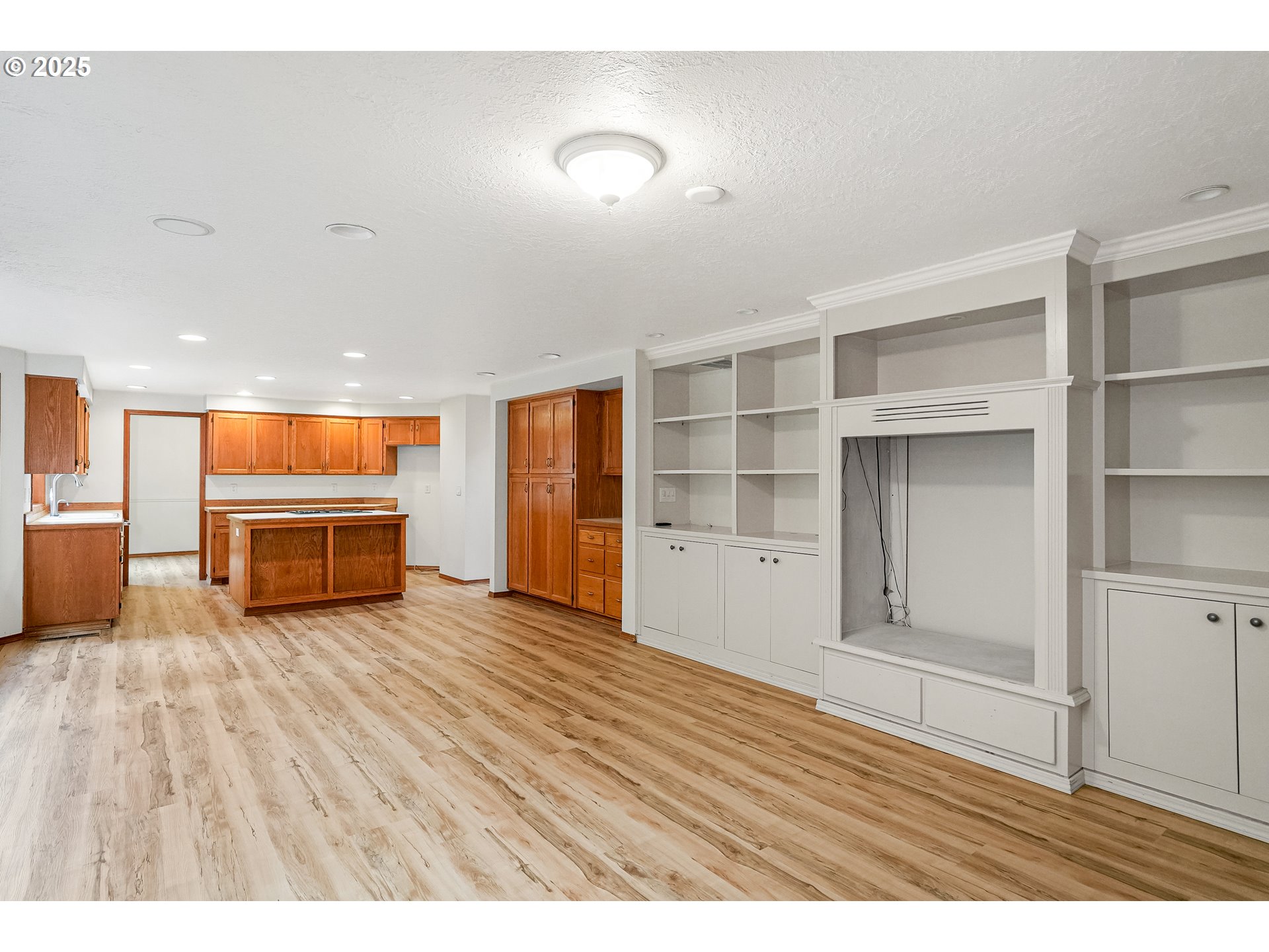 5561 Springwood Avenue Southeast Salem, OR 97306 - Photo 19 of 42 a view of an empty room with a window and wooden floor