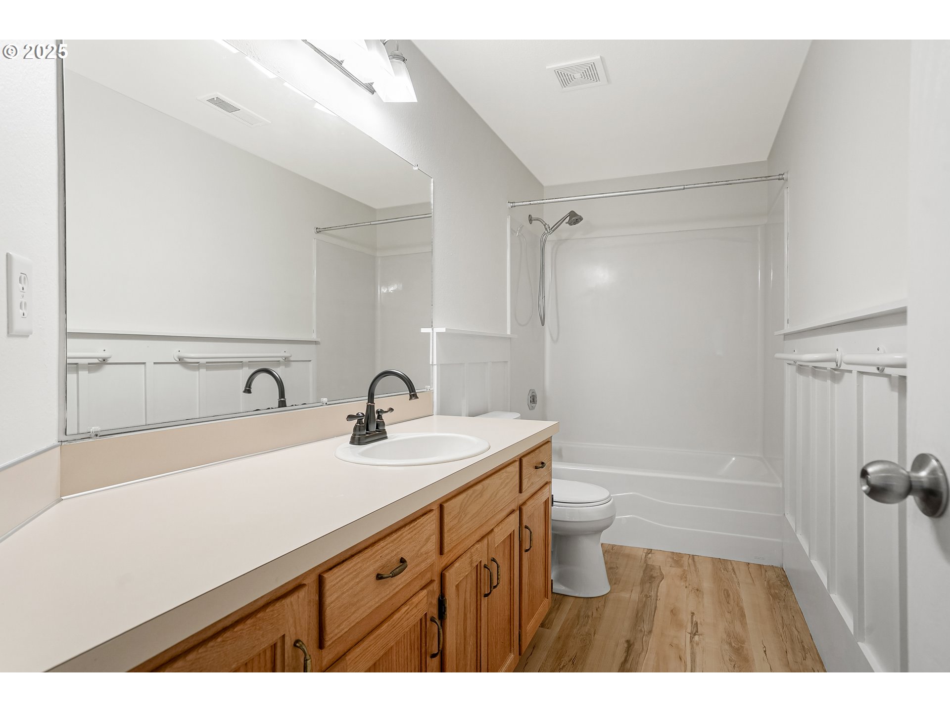 5561 Springwood Avenue Southeast Salem, OR 97306 - Photo 27 of 42 a bathroom with a sink a toilet a shower and a mirror