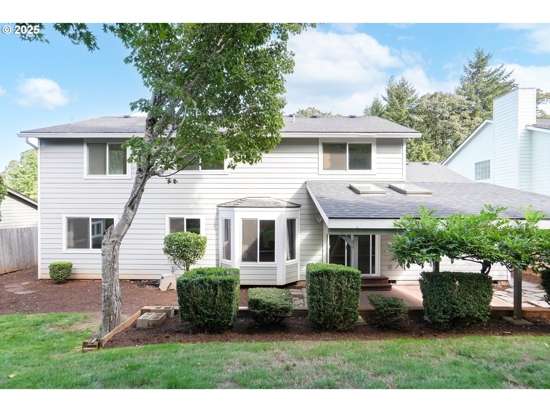 5561 Springwood Avenue Southeast Salem, OR 97306 - Photo 35 of 42 a view of a house with a yard and potted plants