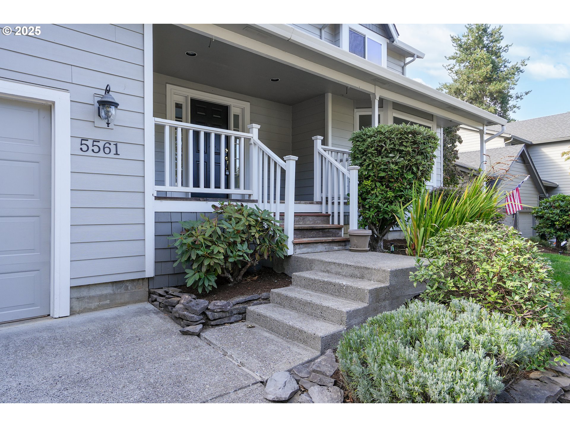 5561 Springwood Avenue Southeast Salem, OR 97306 - Photo 4 of 42 a view of a house with brick walls and a bench