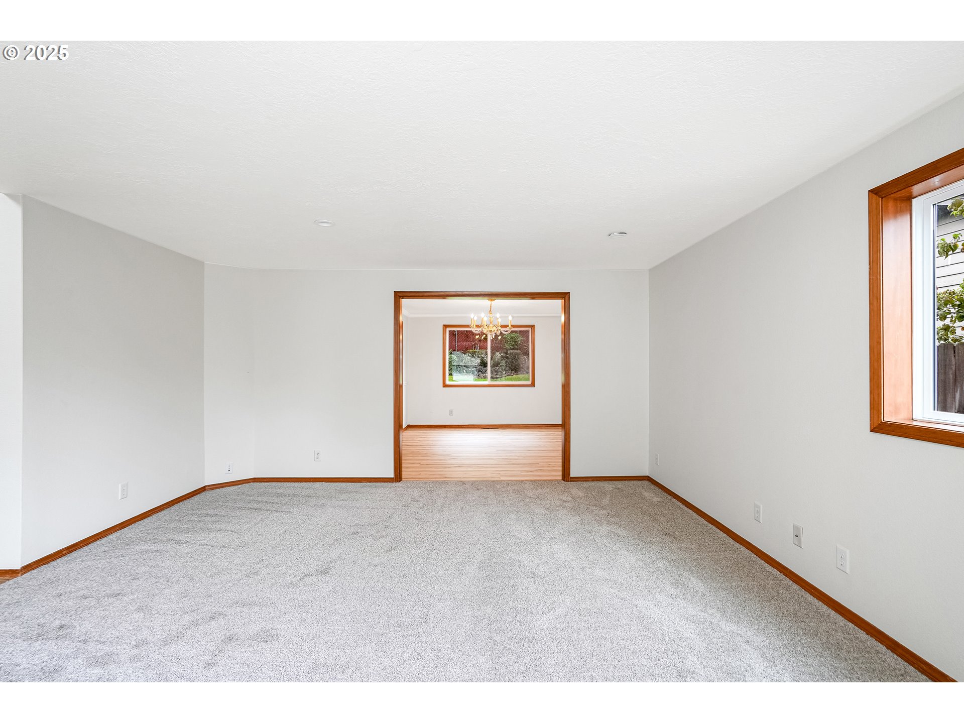 5561 Springwood Avenue Southeast Salem, OR 97306 - Photo 8 of 42 a view of an empty room with a window