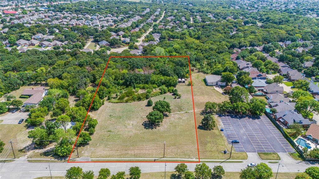 2120 West Sublett Road Arlington, TX 76001 - Photo 1 of 12 an aerial view of residential houses with outdoor space and street view