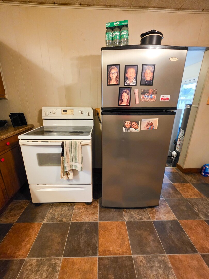 105 Watkins Street Cisne, IL 62823 - Photo 12 of 30 a view of kitchen with washer and dryer