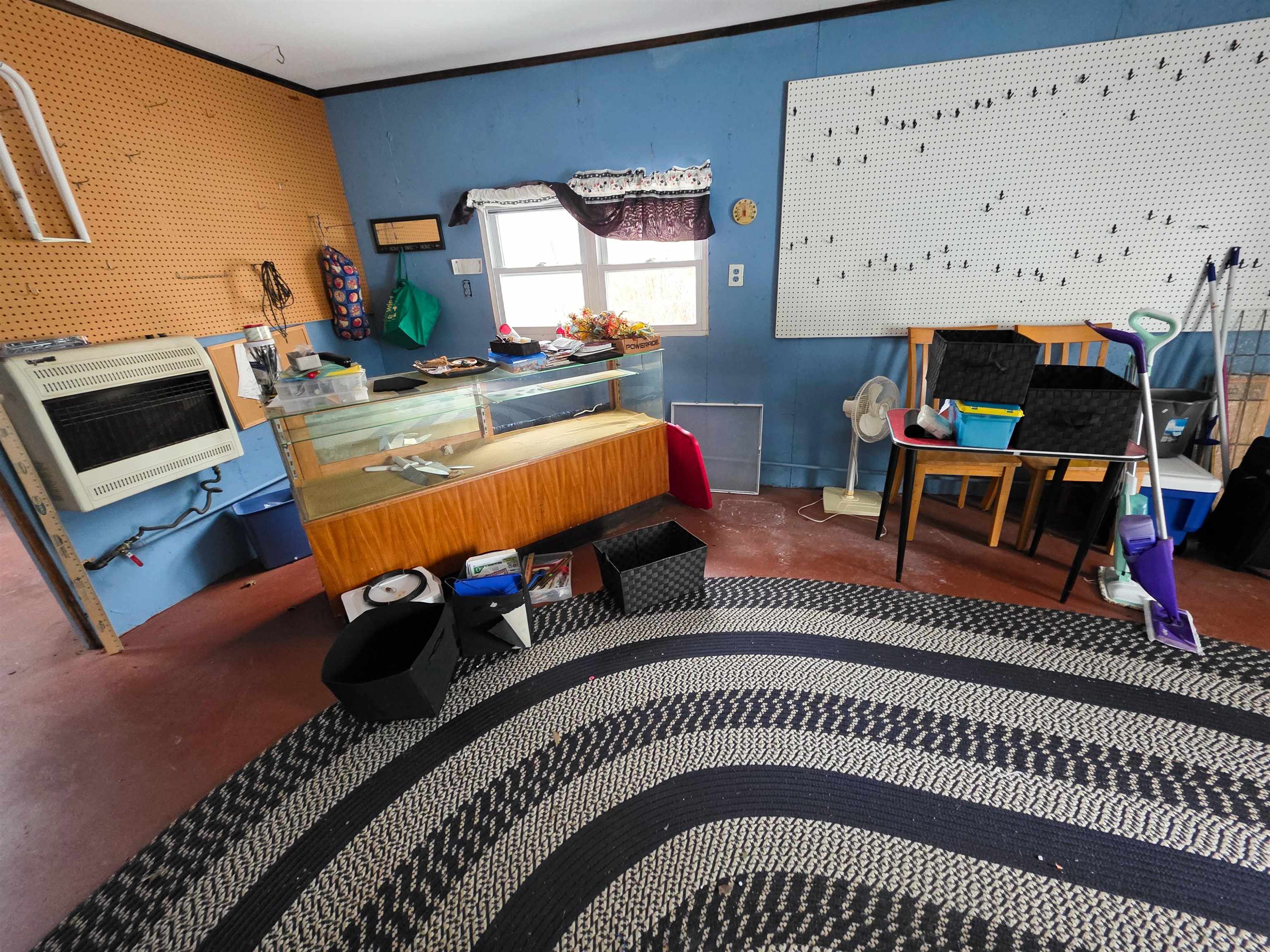 105 Watkins Street Cisne, IL 62823 - Photo 26 of 30 a living room with furniture a table and a flat screen tv