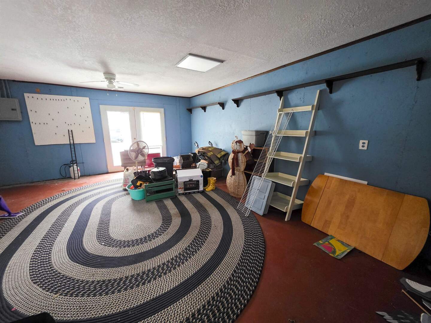 105 Watkins Street Cisne, IL 62823 - Photo 27 of 30 a living room with furniture and a rug