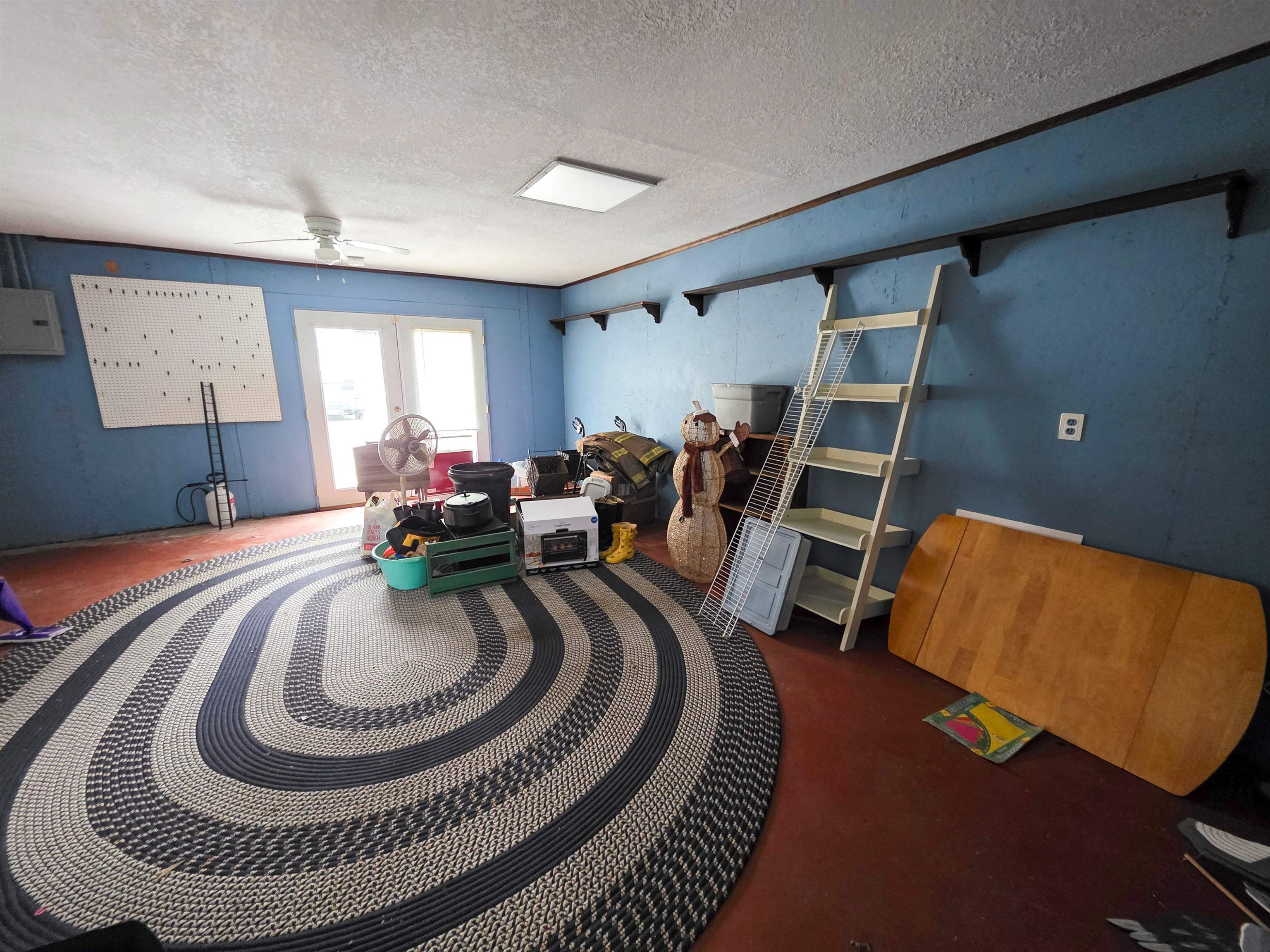 105 Watkins Street Cisne, IL 62823 - Photo 27 of 30 a living room with furniture and a rug