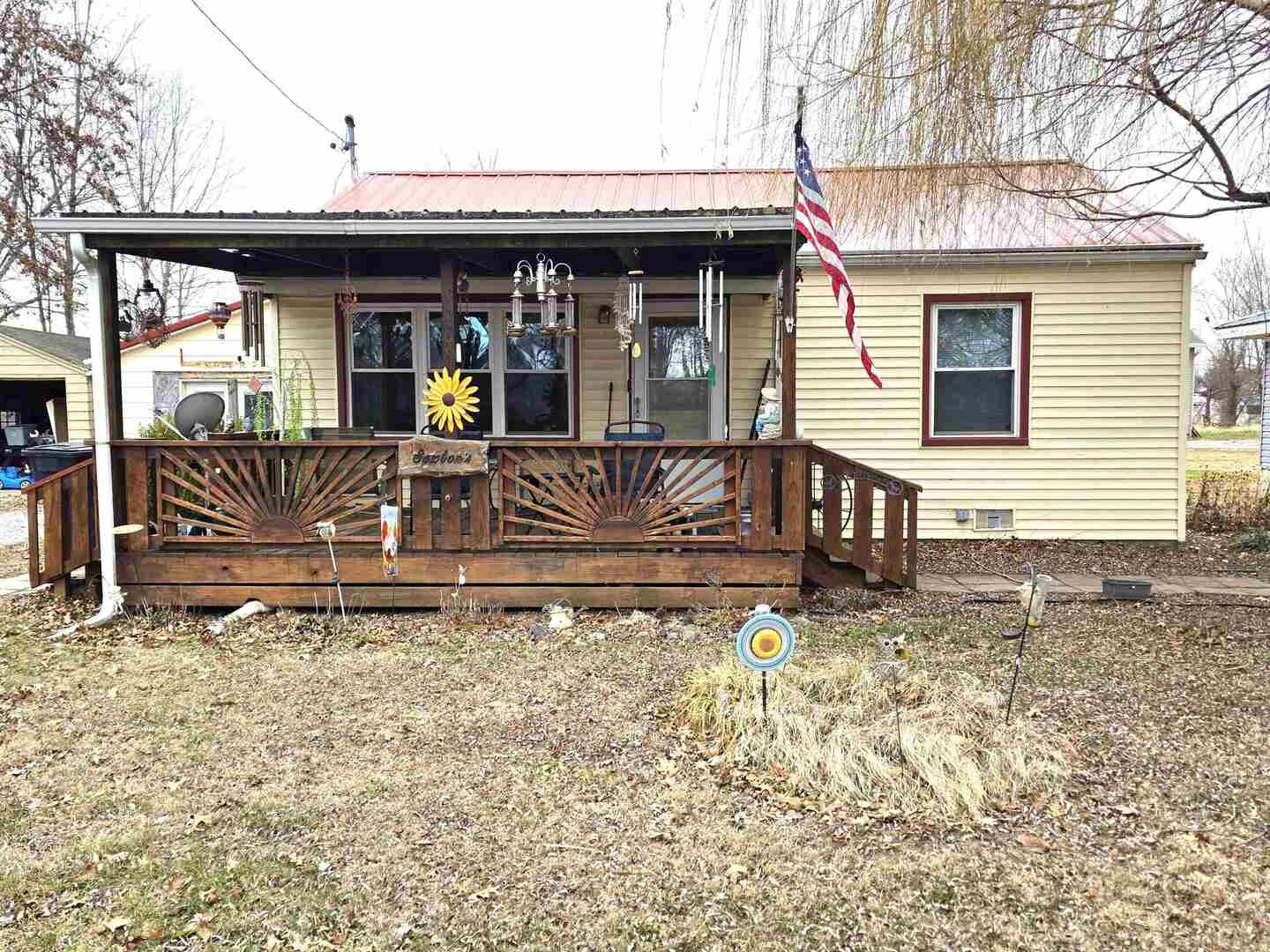 105 Watkins Street Cisne, IL 62823 - Photo 30 of 30 a front view of a house with barbeque porch