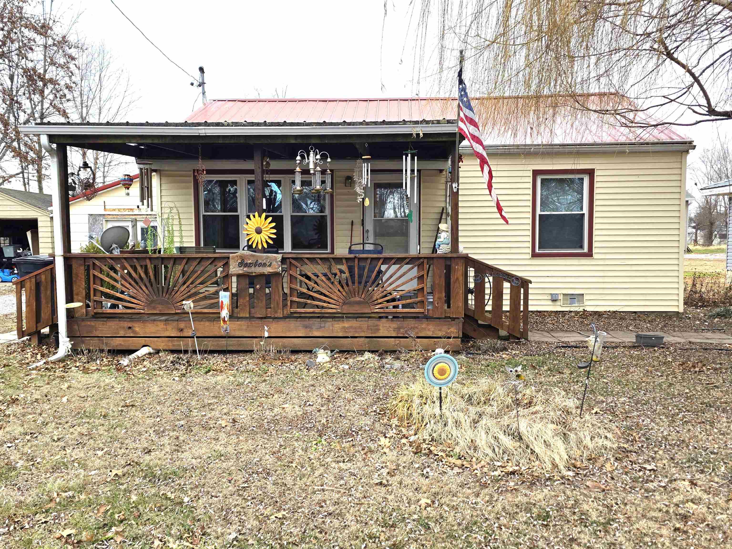 105 Watkins Street Cisne, IL 62823 - Photo 30 of 30 a front view of a house with porch