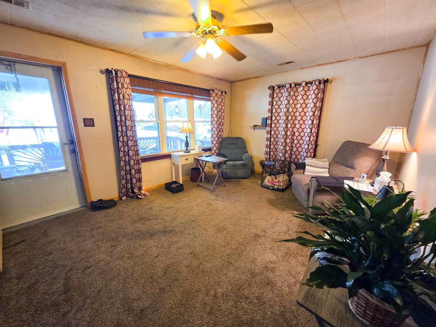 105 Watkins Street Cisne, IL 62823 - Photo 9 of 30 a living room with furniture and a window