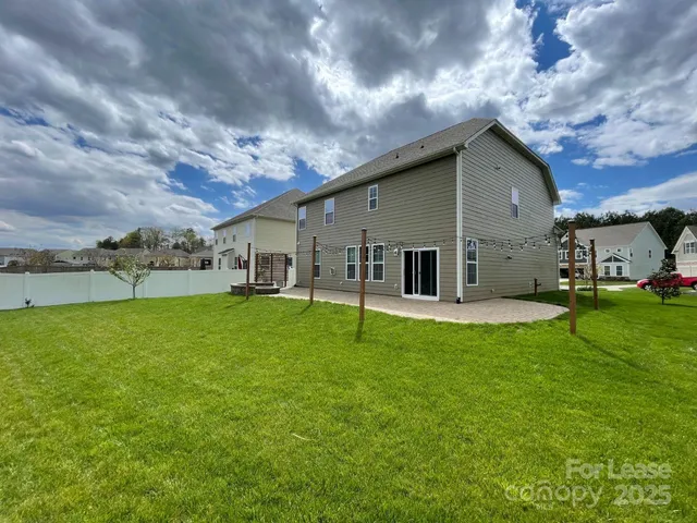 a house view with a garden space