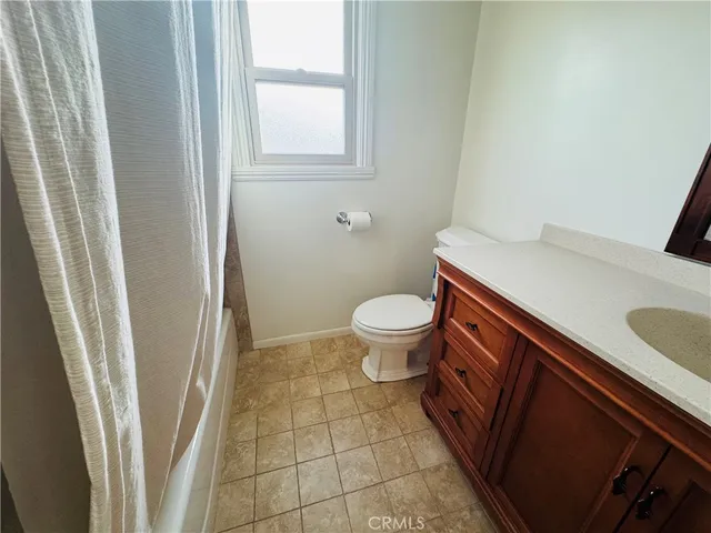 a bathroom with a sink and a vanity
