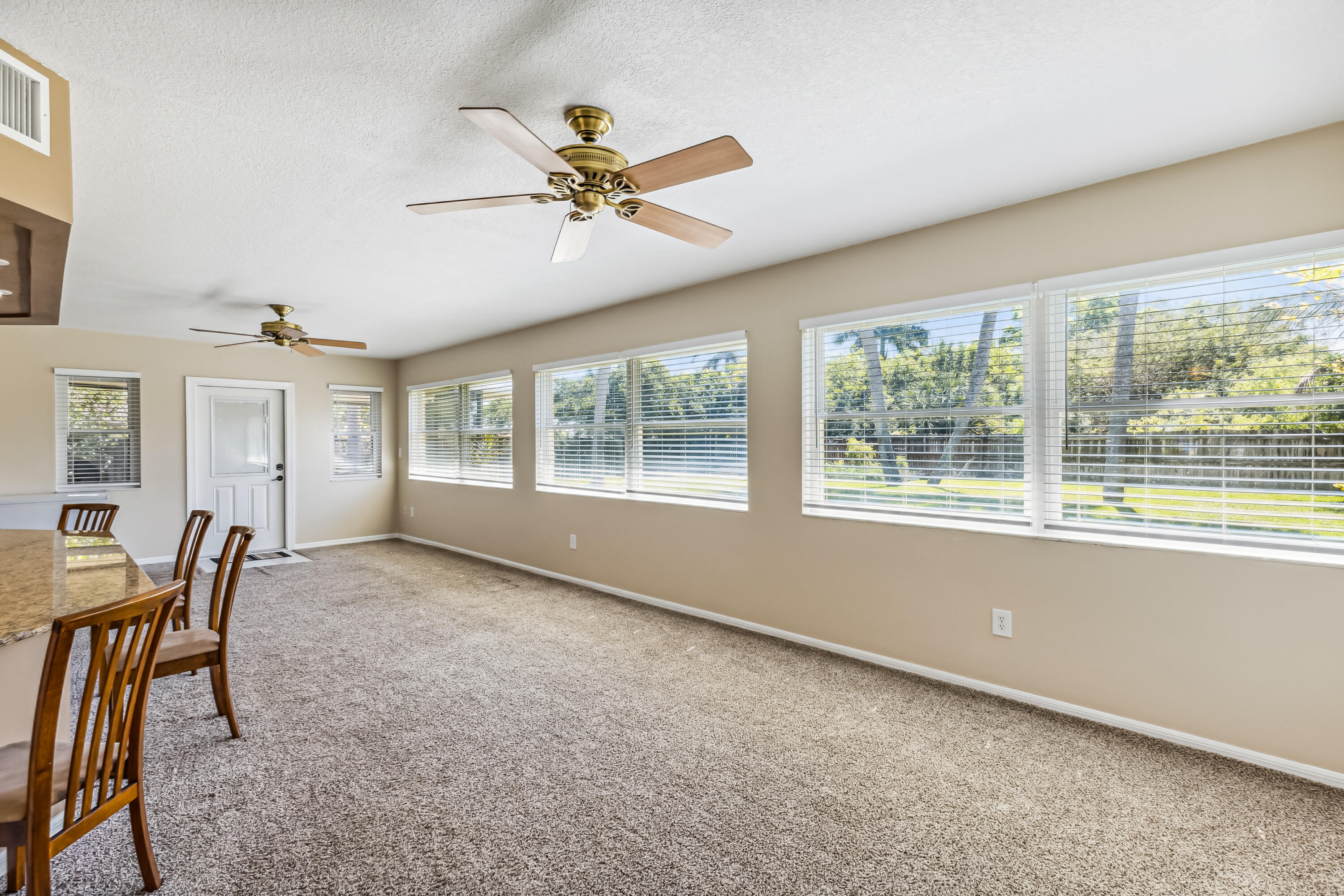 1851 Tallpine Road Melbourne, FL 32935 - Photo 11 of 35 Bright and open 30' x 14' family room