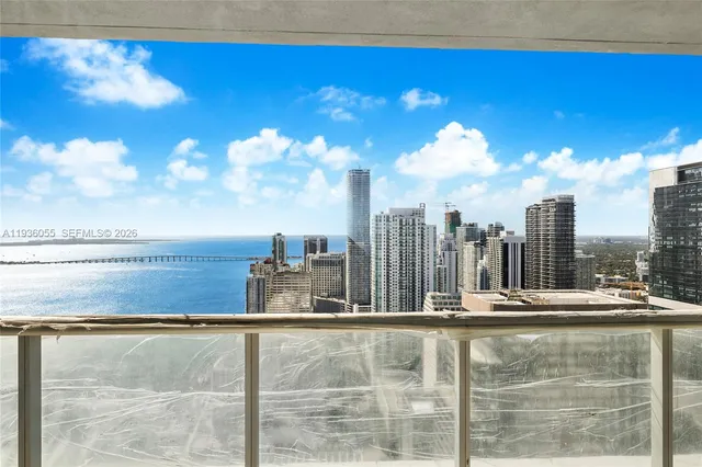 a view of swimming pool with outdoor seating