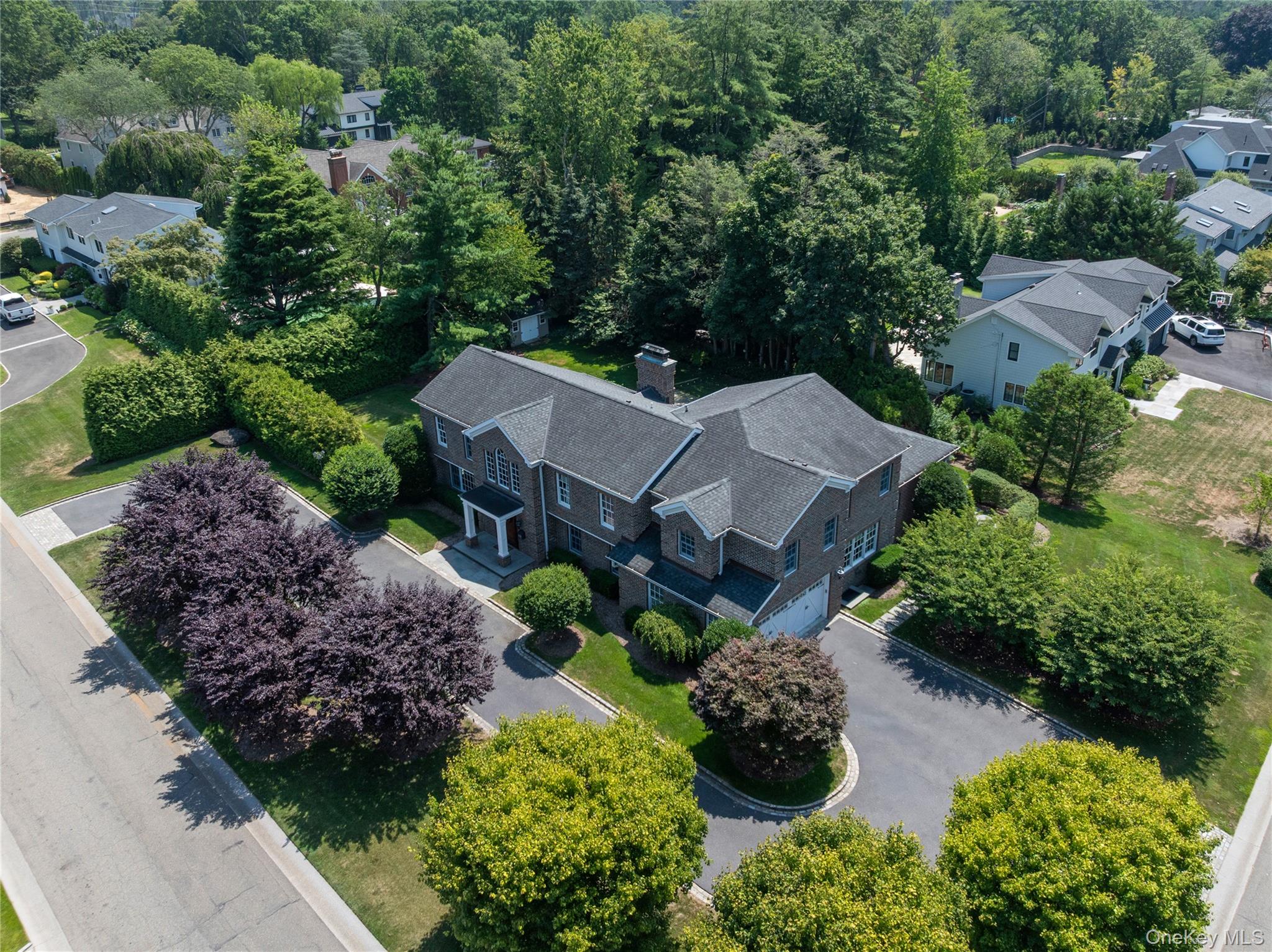 an aerial view of a house with a garden