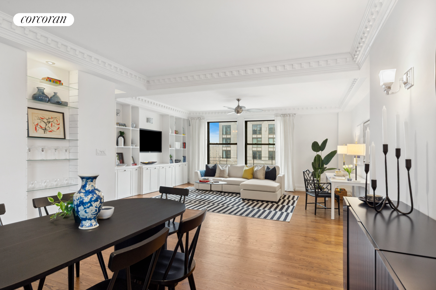 215 West 91st Street, Unit 111 Manhattan, NY 10024 - Photo 4 of 11 a living room with furniture and a wooden floor
