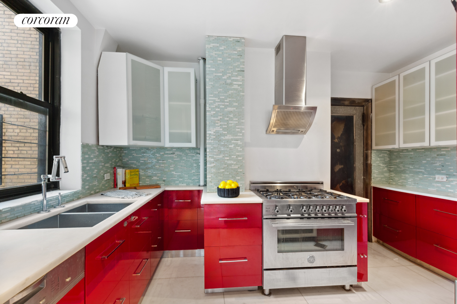 215 West 91st Street, Unit 111 Manhattan, NY 10024 - Photo 6 of 11 a kitchen with stainless steel appliances granite countertop a sink stove and cabinets