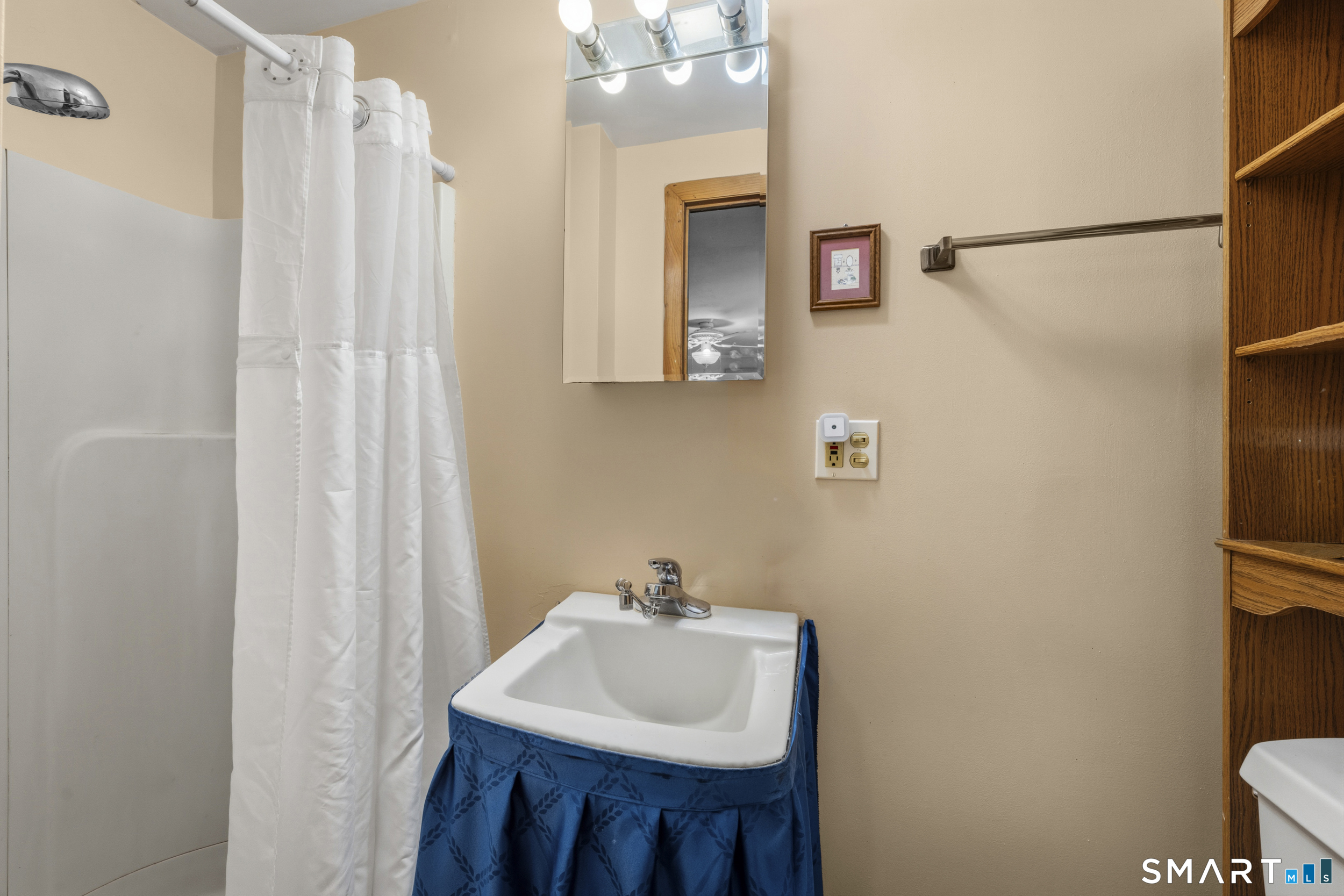 121 River Road Preston, CT 06365 - Photo 12 of 37 a bathroom with a sink and a mirror