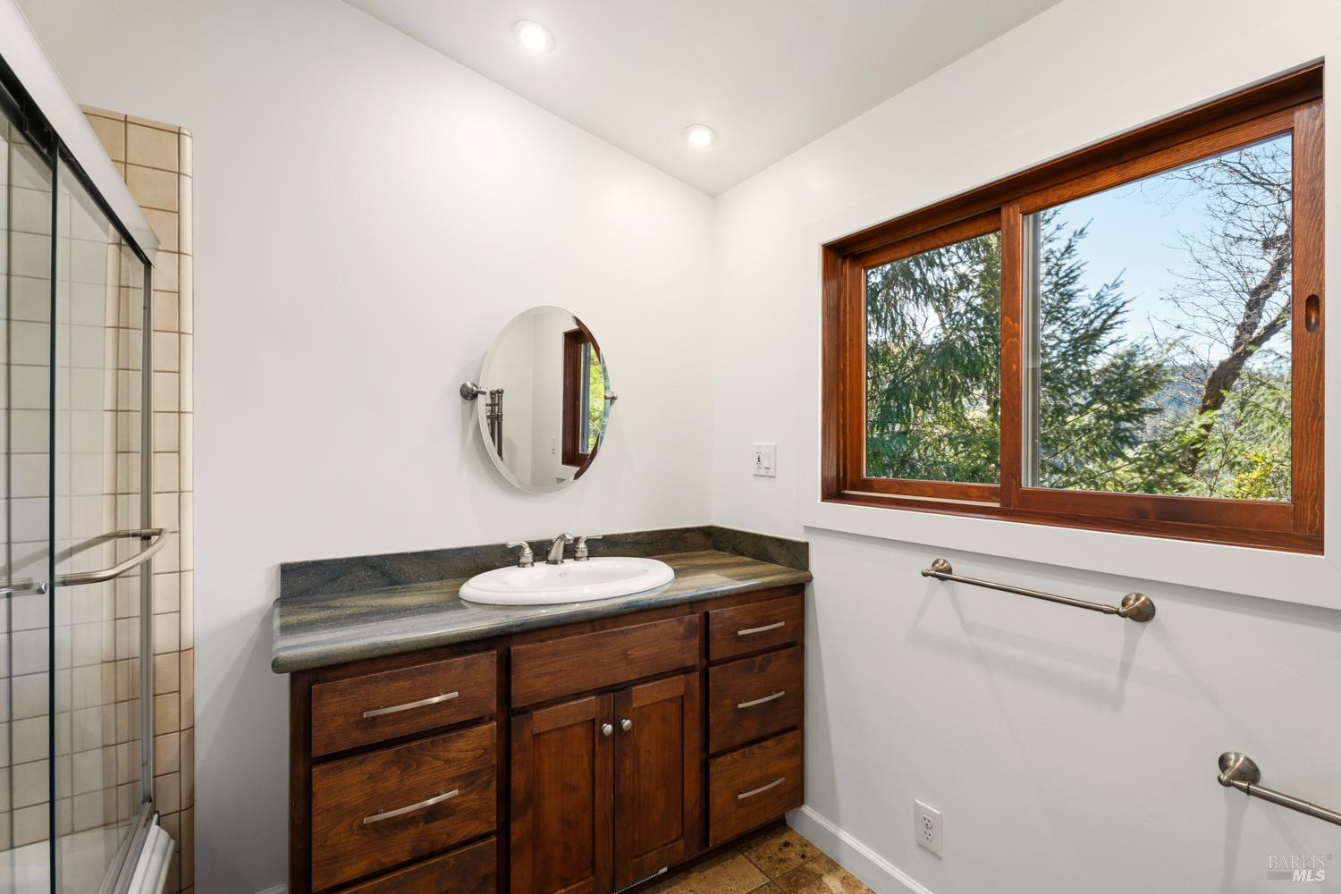 18210 Old Ukiah Pines Road Potter Valley, CA 95469 - Photo 14 of 43 a bathroom with a sink and a mirror