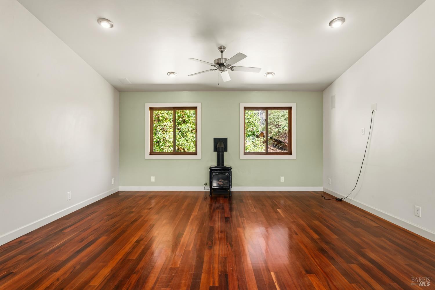 18210 Old Ukiah Pines Road Potter Valley, CA 95469 - Photo 18 of 43 wooden floor in an empty room with a window