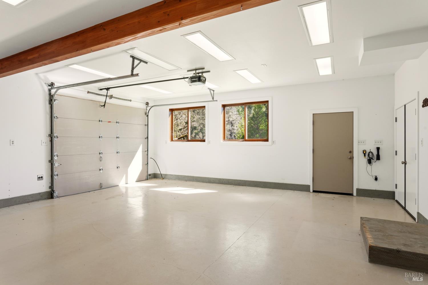 18210 Old Ukiah Pines Road Potter Valley, CA 95469 - Photo 28 of 43 a view of an empty room with a window