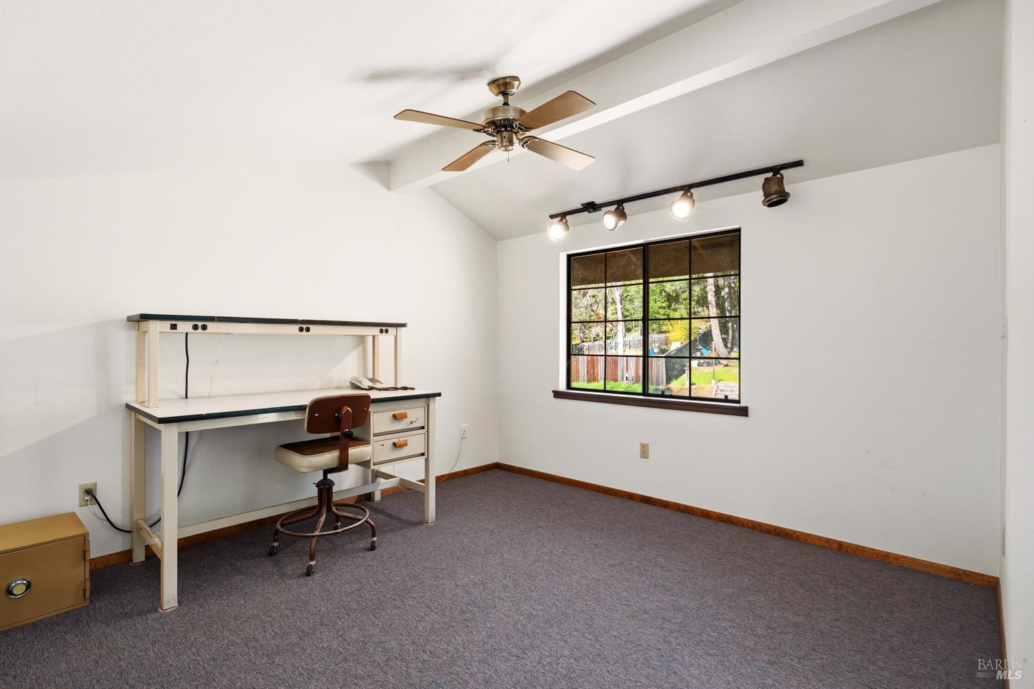 18210 Old Ukiah Pines Road Potter Valley, CA 95469 - Photo 32 of 43 a view of room with a window and a ceiling fan