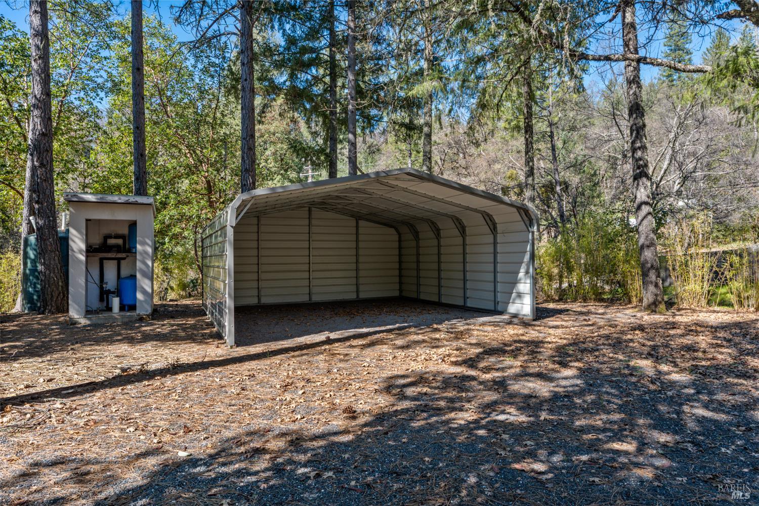 18210 Old Ukiah Pines Road Potter Valley, CA 95469 - Photo 40 of 43 a view of a house with a yard and garage