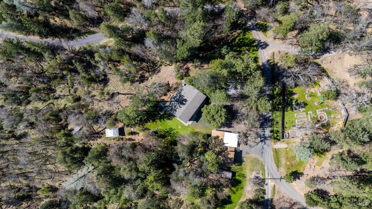 18210 Old Ukiah Pines Road Potter Valley, CA 95469 - Photo 42 of 43 an aerial view of residential house with parking and trees