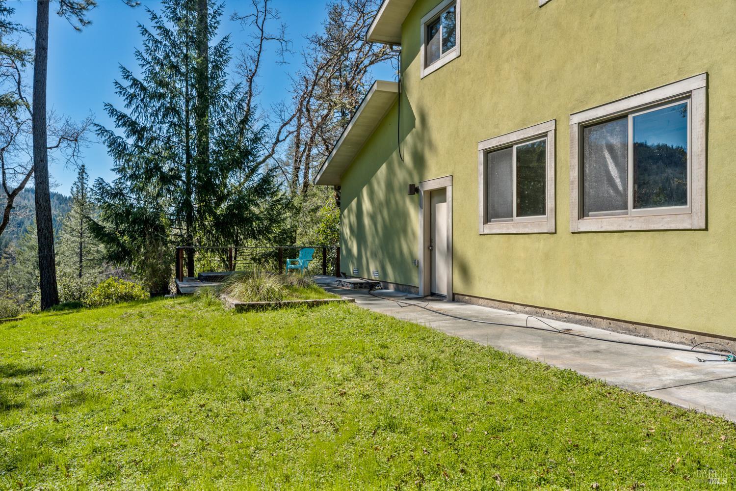 18210 Old Ukiah Pines Road Potter Valley, CA 95469 - Photo 5 of 43 a view of a house with pool and sitting area