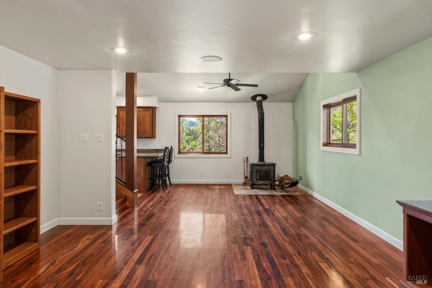 18210 Old Ukiah Pines Road Potter Valley, CA 95469 - Photo 6 of 43 wooden floor in an empty room with a window