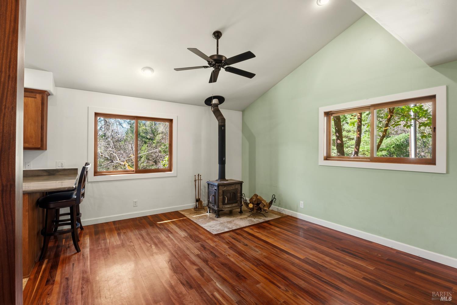 18210 Old Ukiah Pines Road Potter Valley, CA 95469 - Photo 7 of 43 a living room with hardwood floor and a window