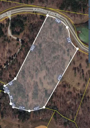 a view of a house with backyard porch and sitting area