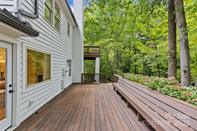 a view of a house with a roof deck