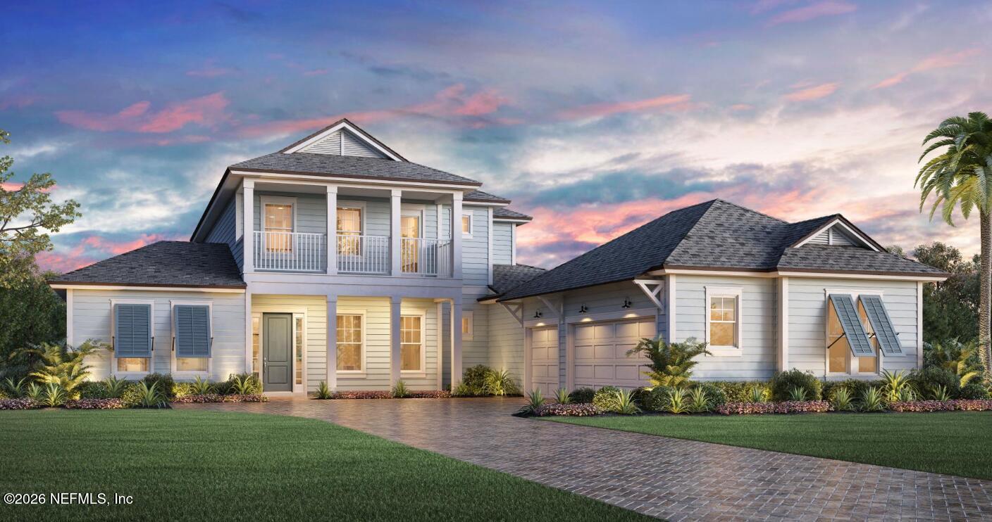 front view of a house with a yard