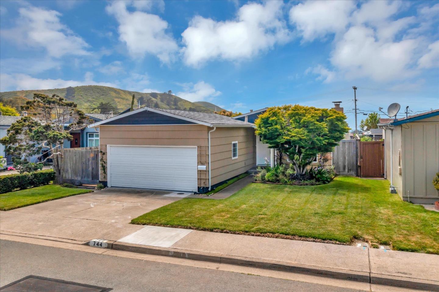 744 Arleen Way Pacifica, CA 94044 - Photo 2 of 9 a view of a house with back yard
