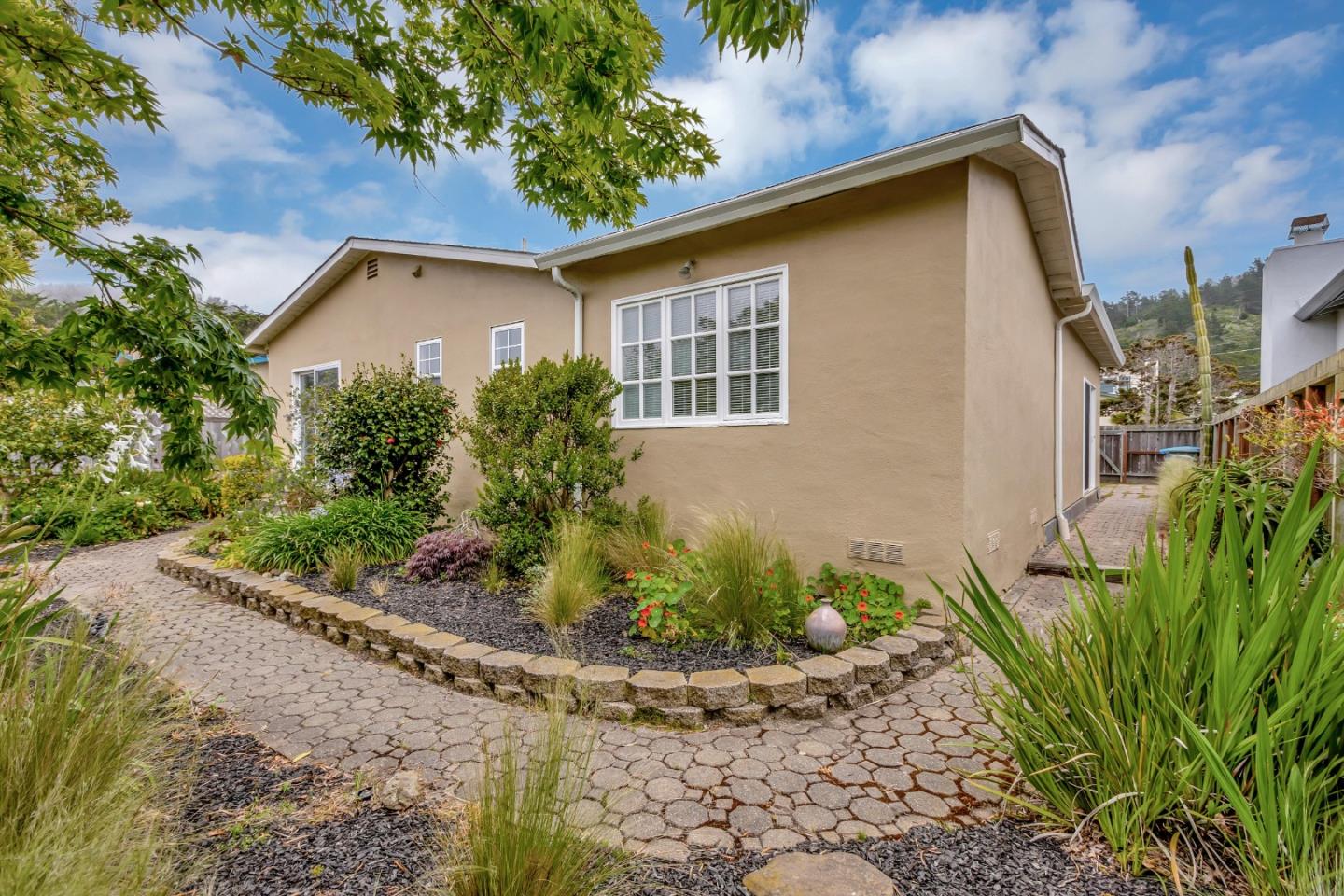 744 Arleen Way Pacifica, CA 94044 - Photo 6 of 9 a view of a backyard with plants