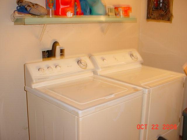 3307 Wiley Road Yakima, WA 98903 - Photo 12 of 13 a utility room with dryer and washer