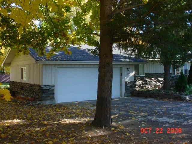 3307 Wiley Road Yakima, WA 98903 - Photo 4 of 13 a front view of a house with a garden