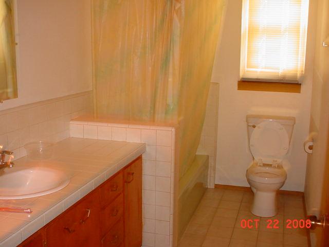 3307 Wiley Road Yakima, WA 98903 - Photo 9 of 13 a bathroom with a sink and a mirror
