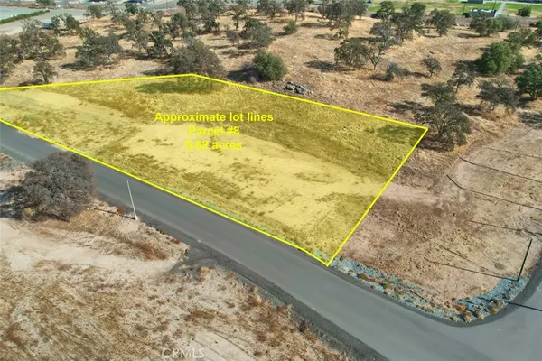 a view of a backyard of the house